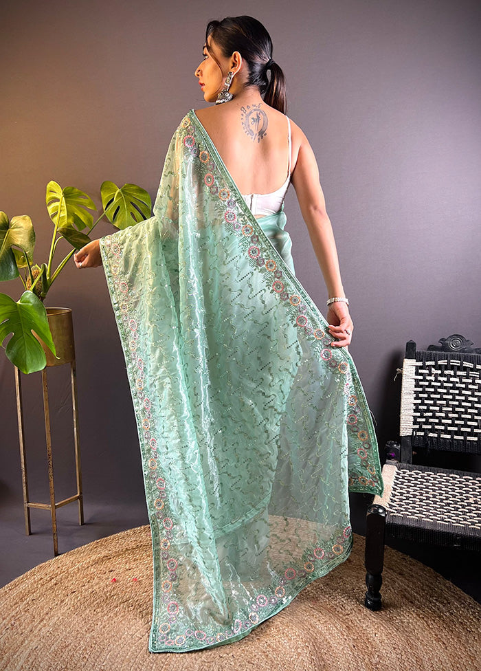 Sea Green Net Net Saree With Blouse Piece