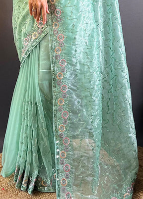 Sea Green Net Net Saree With Blouse Piece