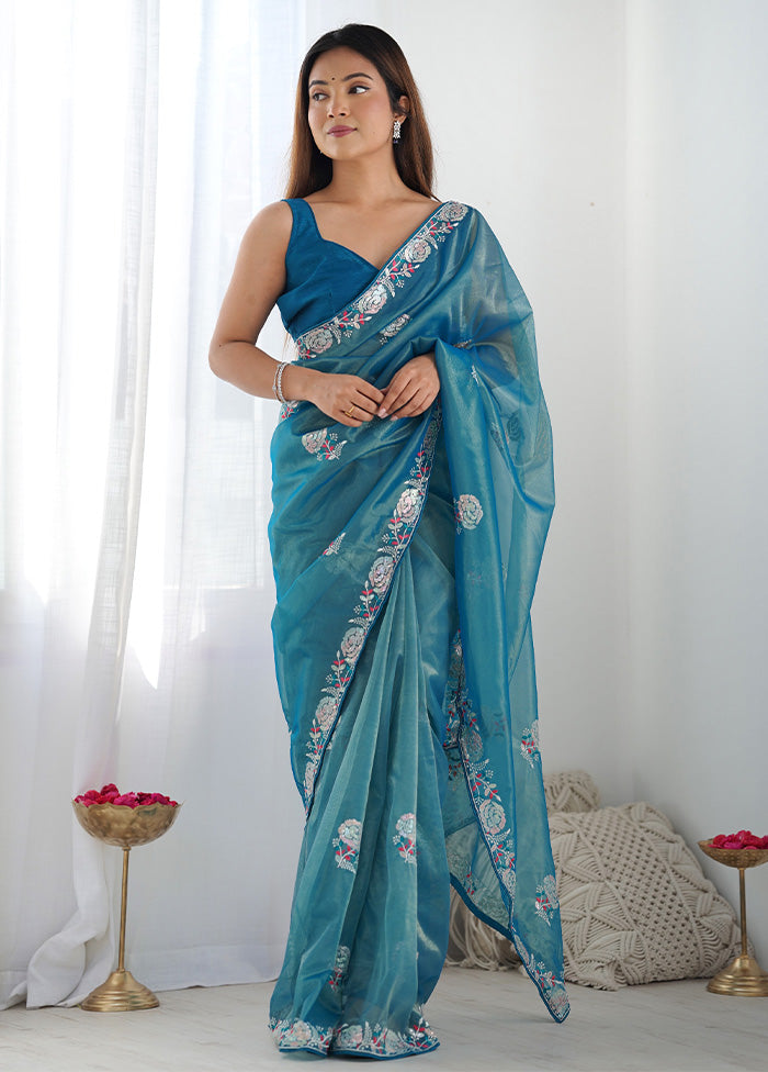 Teal Blue Net Net Saree With Blouse Piece