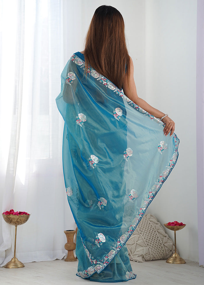 Teal Blue Net Net Saree With Blouse Piece