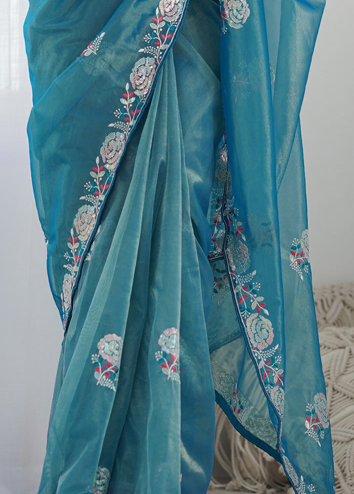 Teal Blue Net Net Saree With Blouse Piece