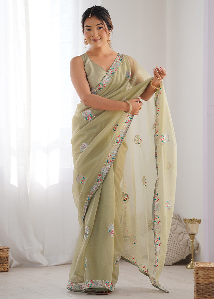 Pista Green Net Net Saree With Blouse Piece