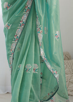 Sea Green Net Net Saree With Blouse Piece