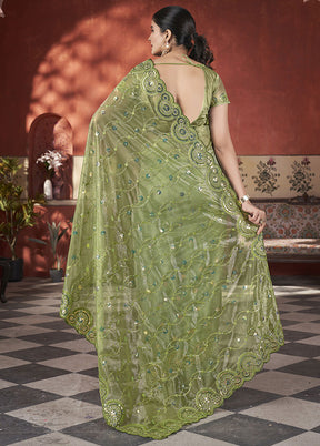 Green Net Net Saree With Blouse Piece