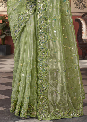 Green Net Net Saree With Blouse Piece