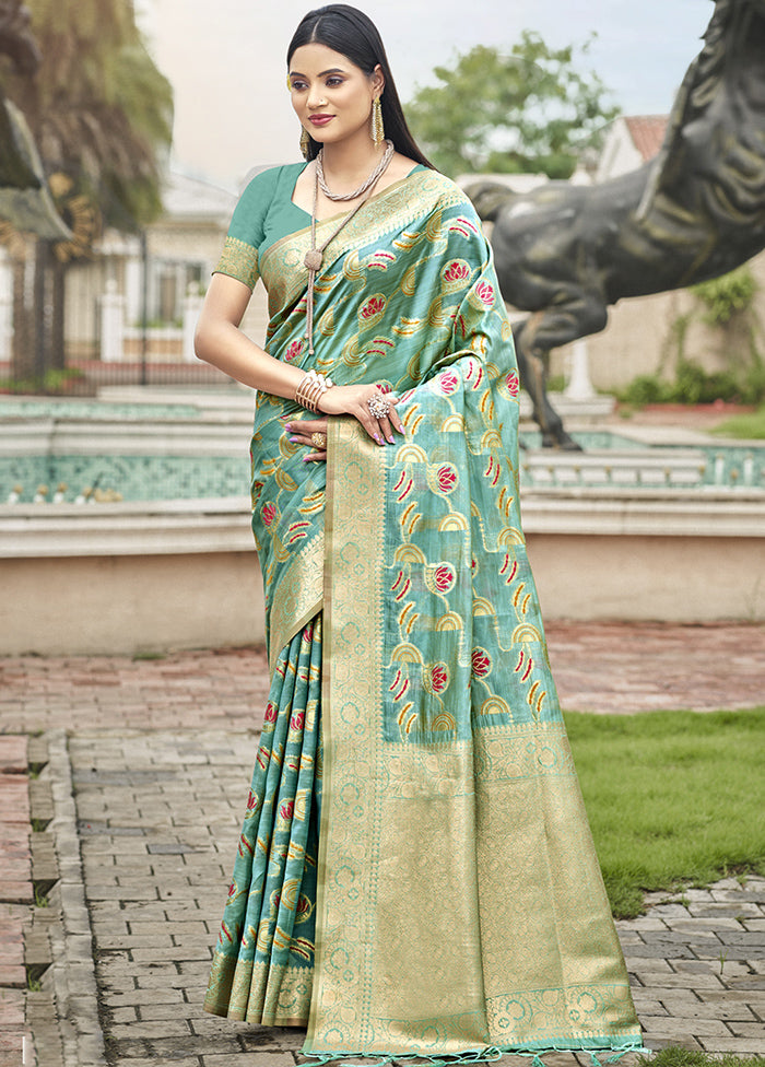 Teal Blue Organza Saree With Blouse Piece