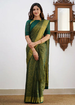 Green Banarasi Silk Saree With Blouse Piece