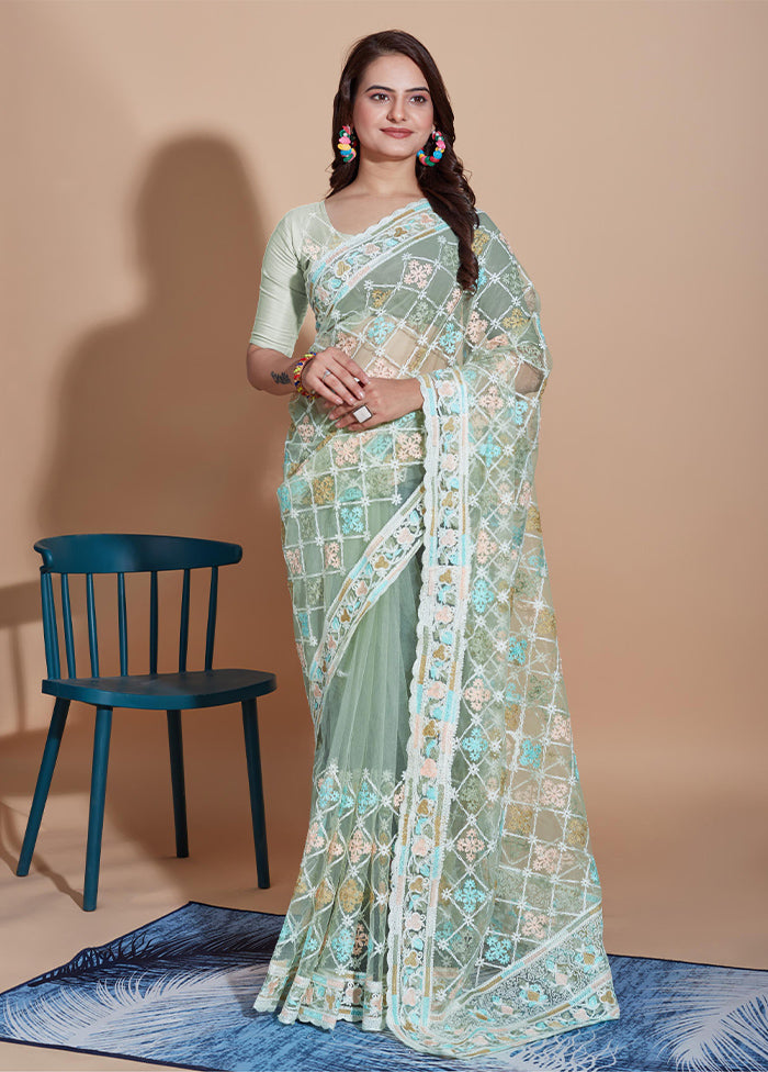 Pista Green Net Net Saree With Blouse Piece