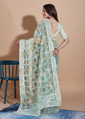 Pista Green Net Saree With Blouse Piece