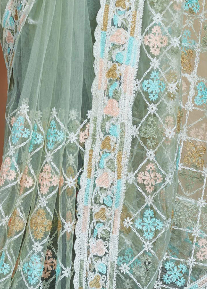 Pista Green Net Saree With Blouse Piece