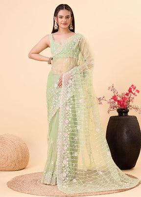 Pista Green Net Saree With Blouse Piece