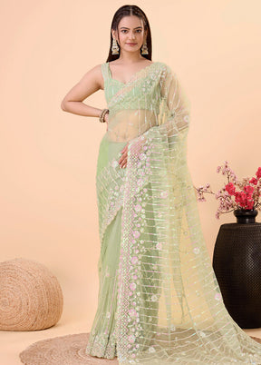 Pista Green Net Net Saree With Blouse Piece