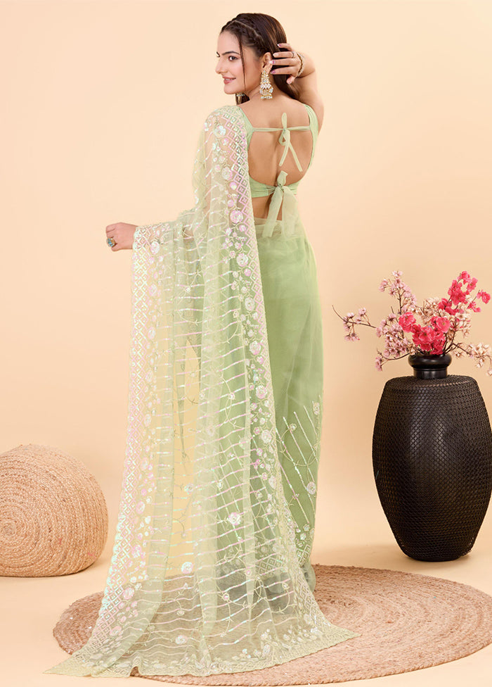 Pista Green Net Saree With Blouse Piece