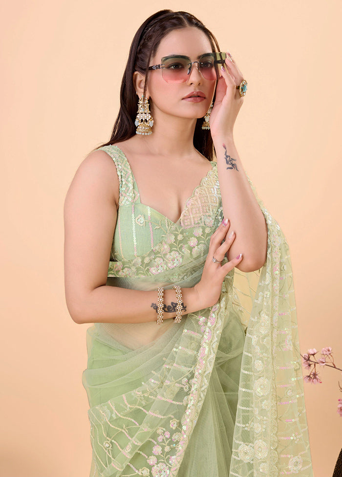 Pista Green Net Net Saree With Blouse Piece