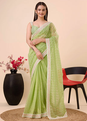 Light Green Net Net Saree With Blouse Piece