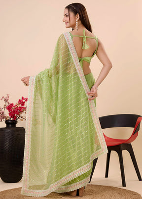 Light Green Net Net Saree With Blouse Piece