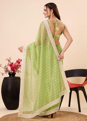 Light Green Net Saree With Blouse Piece