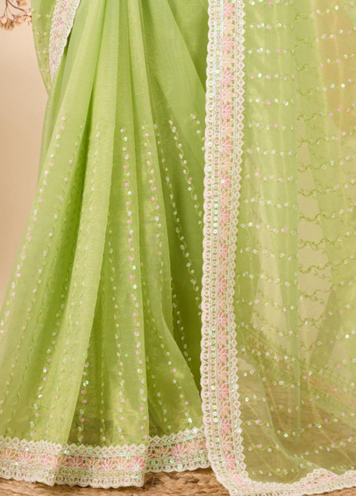 Light Green Net Net Saree With Blouse Piece