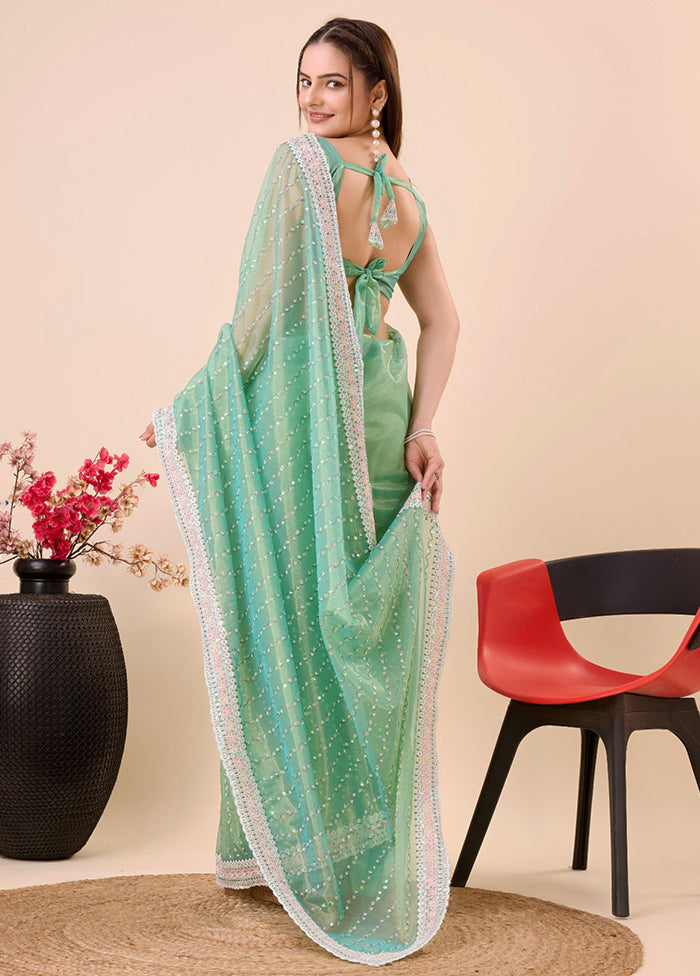 Mint Green Net Net Saree With Blouse Piece