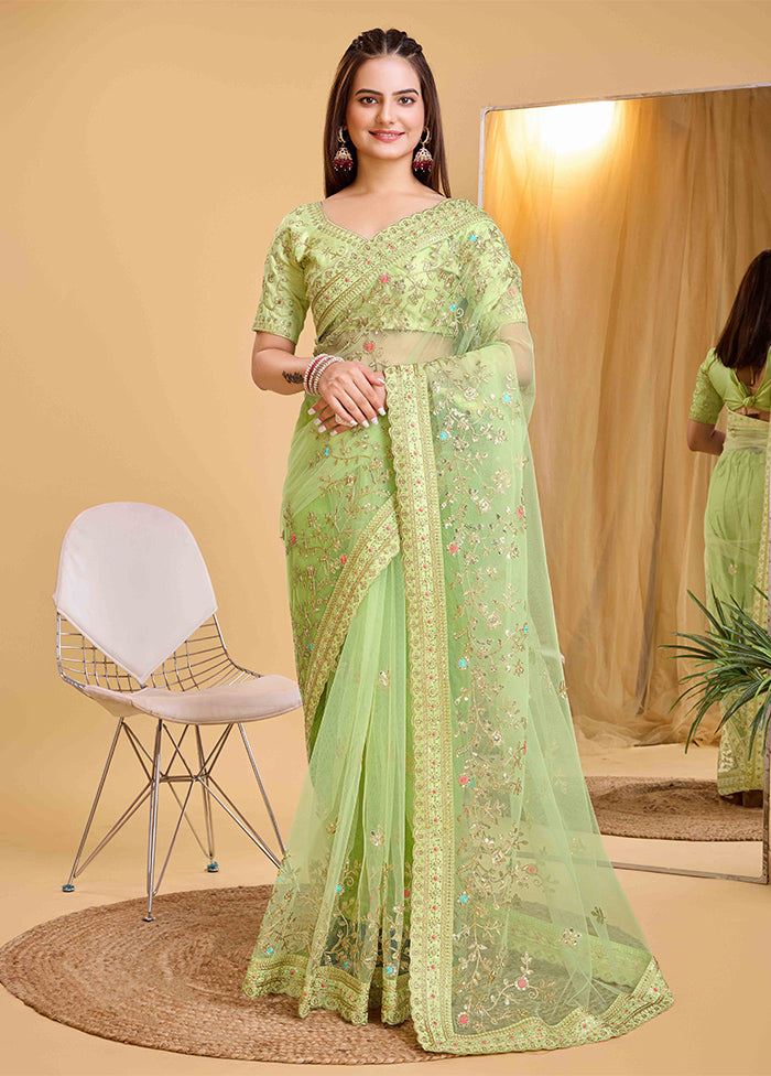 Pista Green Net Net Saree With Blouse Piece