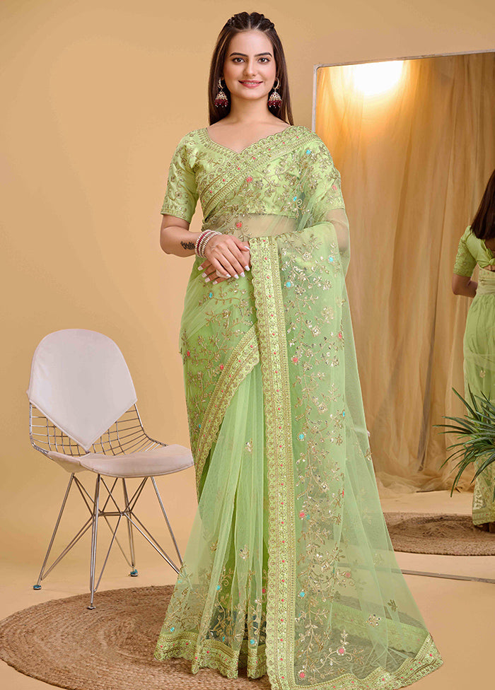 Pista Green Net Net Saree With Blouse Piece