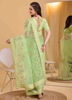 Pista Green Net Net Saree With Blouse Piece