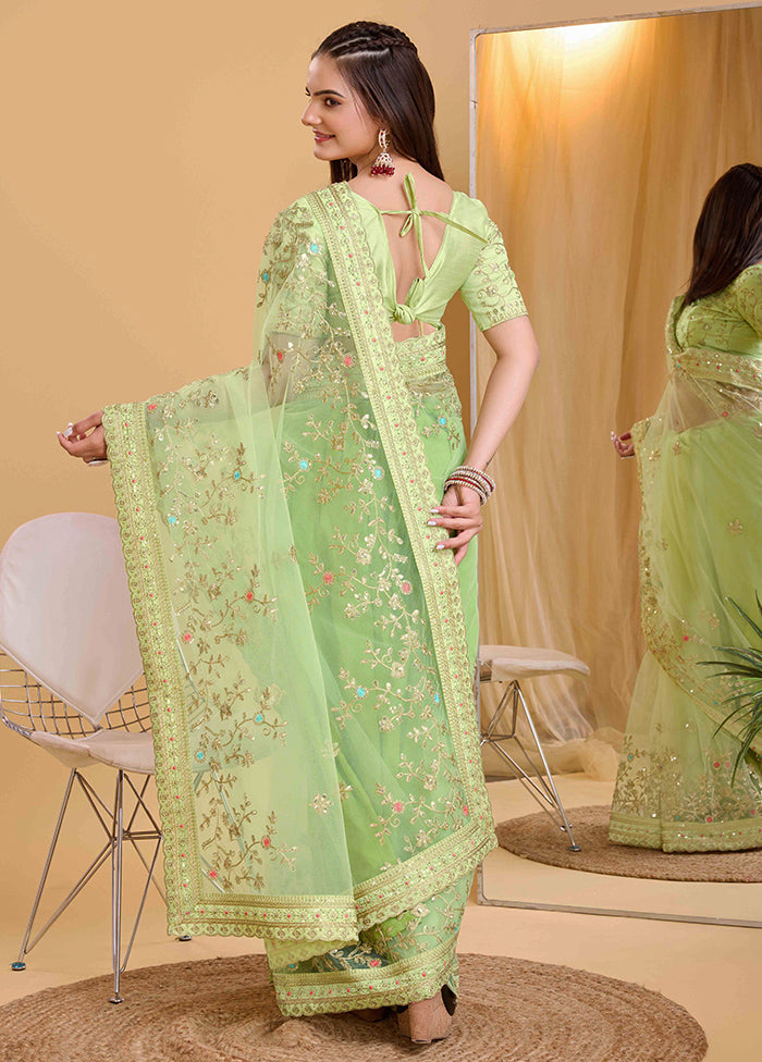 Pista Green Net Net Saree With Blouse Piece