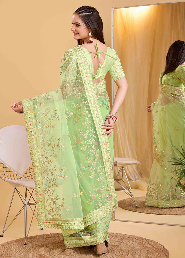 Pista Green Net Saree With Blouse Piece