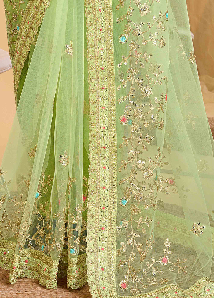 Pista Green Net Saree With Blouse Piece