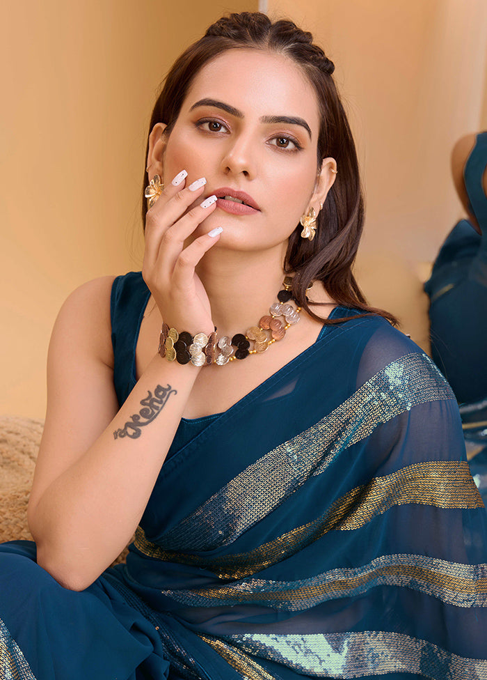 Teal Georgette Saree With Blouse Piece