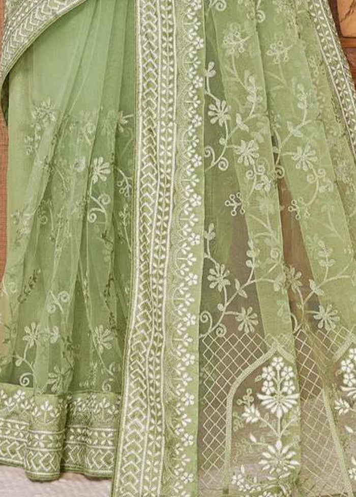 Pista Green Net Net Saree With Blouse Piece