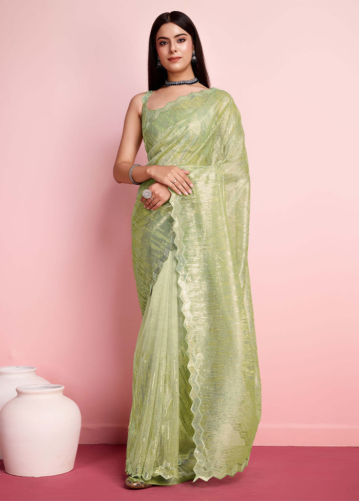 Pista Green Net Saree With Blouse Piece