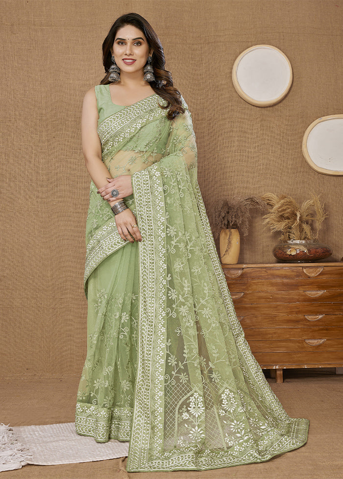 Pista Green Net Saree With Blouse Piece