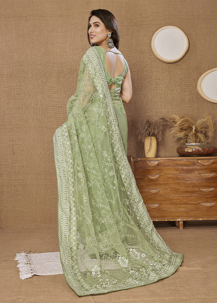 Pista Green Net Net Saree With Blouse Piece