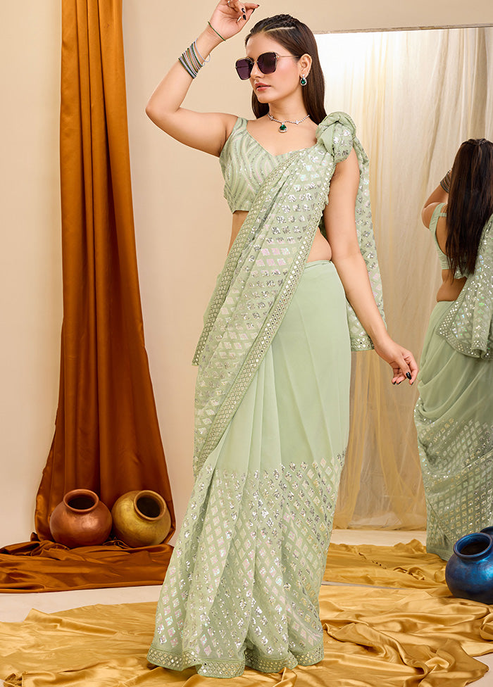 Pista Green Georgette Saree With Blouse Piece