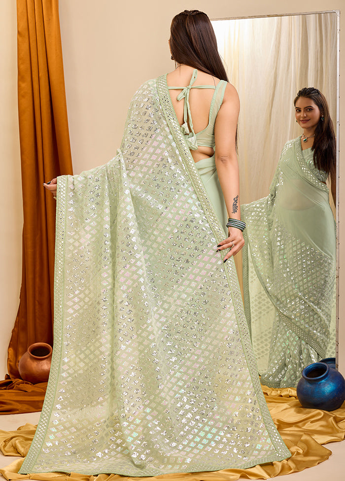 Pista Green Georgette Saree With Blouse Piece