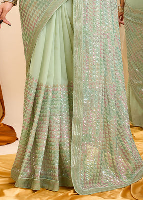 Pista Green Georgette Saree With Blouse Piece