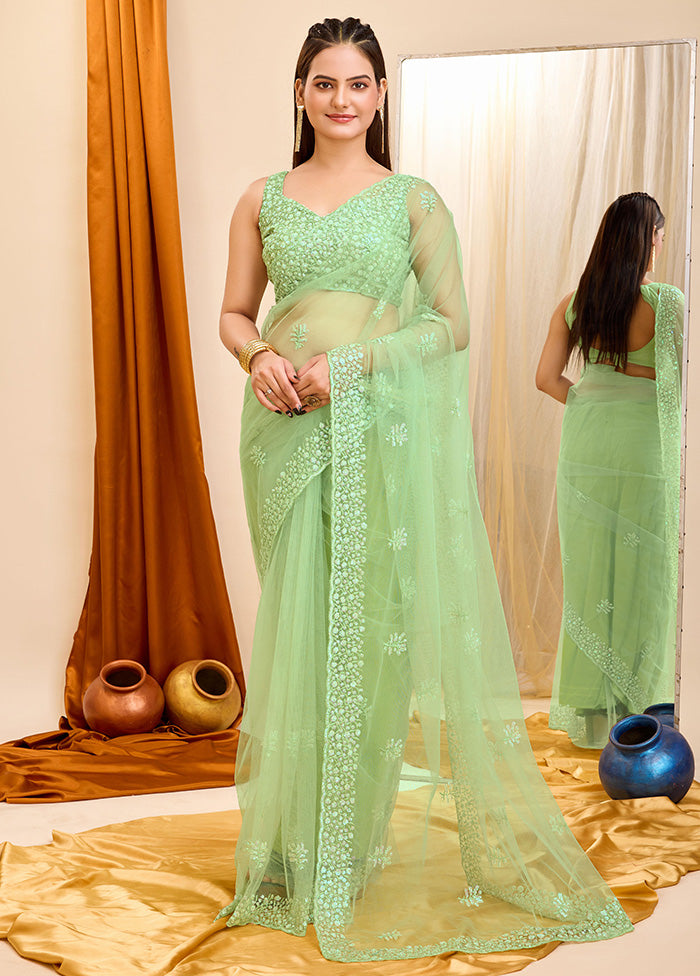 Pista Green Net Net Saree With Blouse Piece