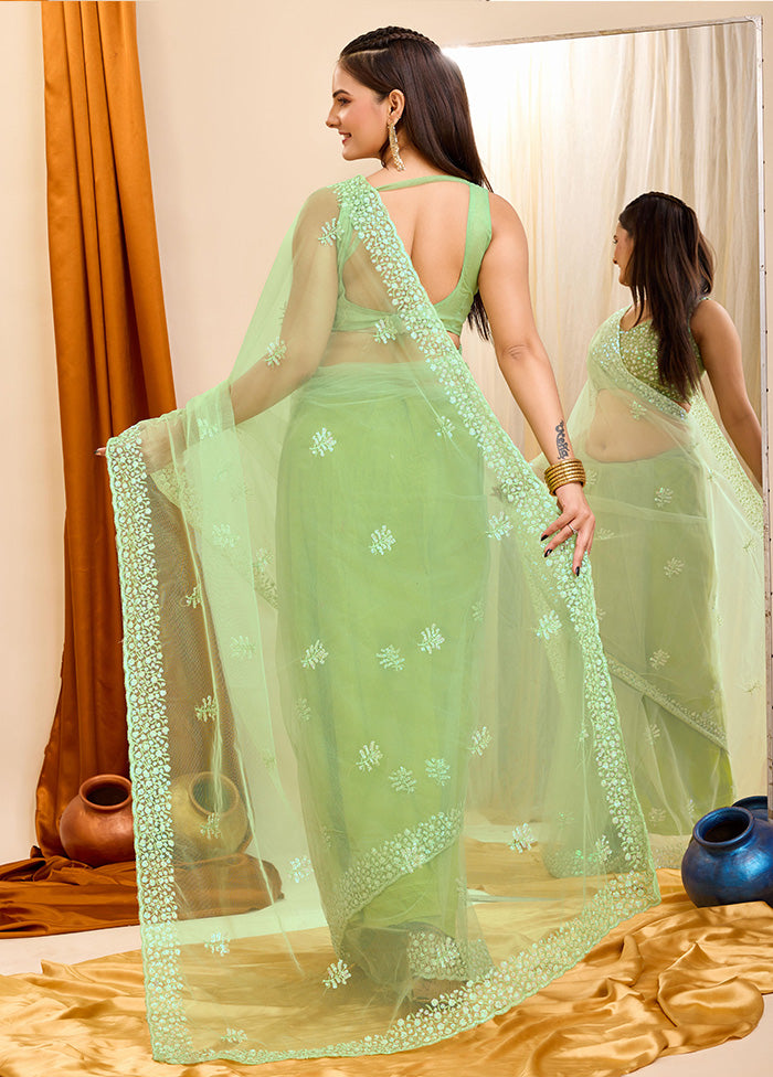 Pista Green Net Net Saree With Blouse Piece