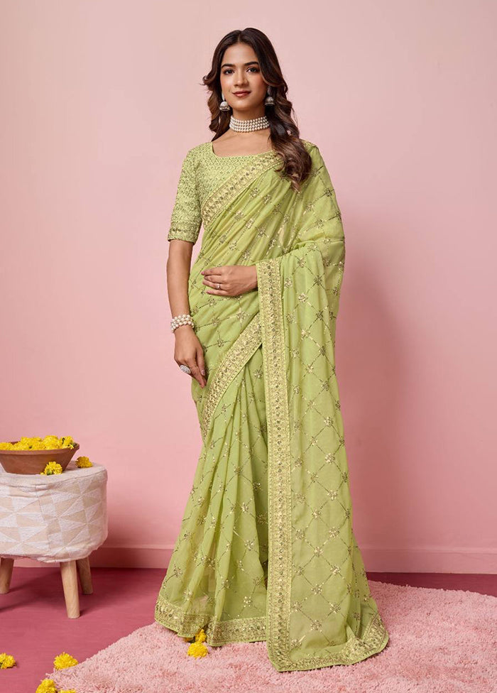 Pista Green Georgette Saree With Blouse Piece