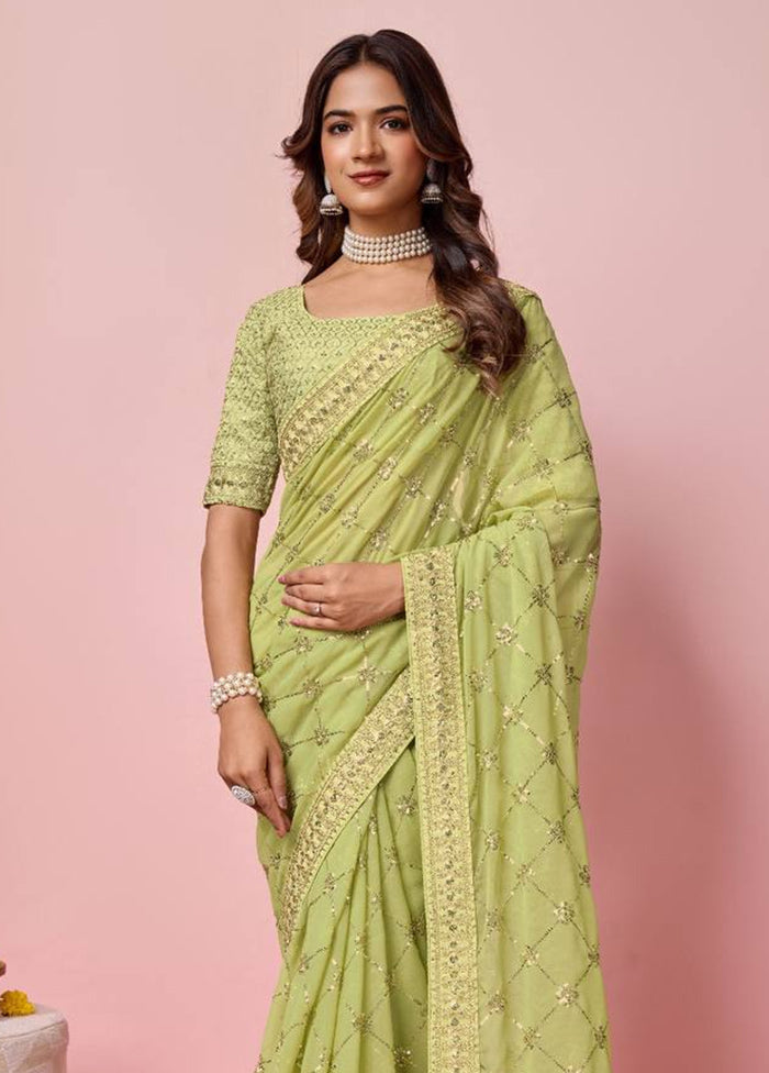 Pista Green Georgette Saree With Blouse Piece