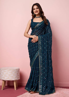 Teal Georgette Saree With Blouse Piece