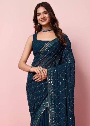 Teal Georgette Saree With Blouse Piece