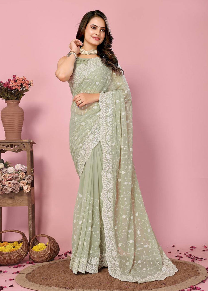 Pista Green Georgette Saree With Blouse Piece