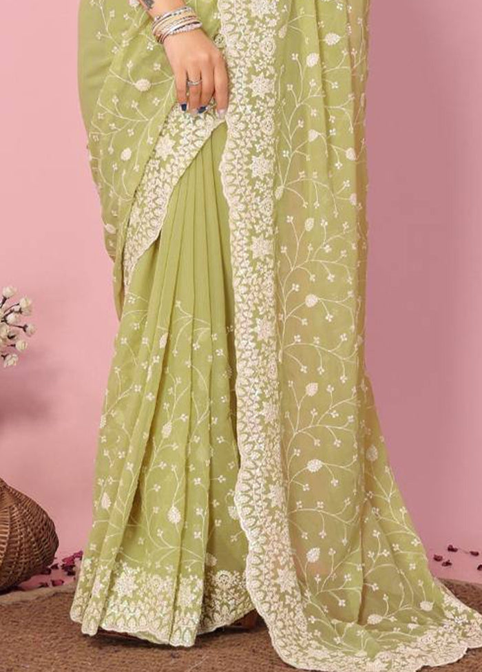 Pista Green Georgette Saree With Blouse Piece