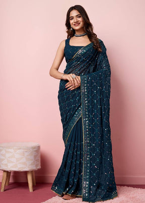 Teal Georgette Saree With Blouse Piece