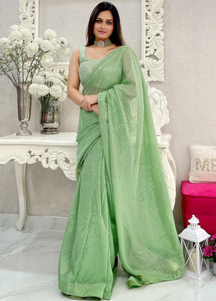 Pista Green Georgette Saree With Blouse Piece