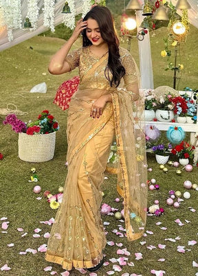 Gold Net Net Saree With Blouse Piece