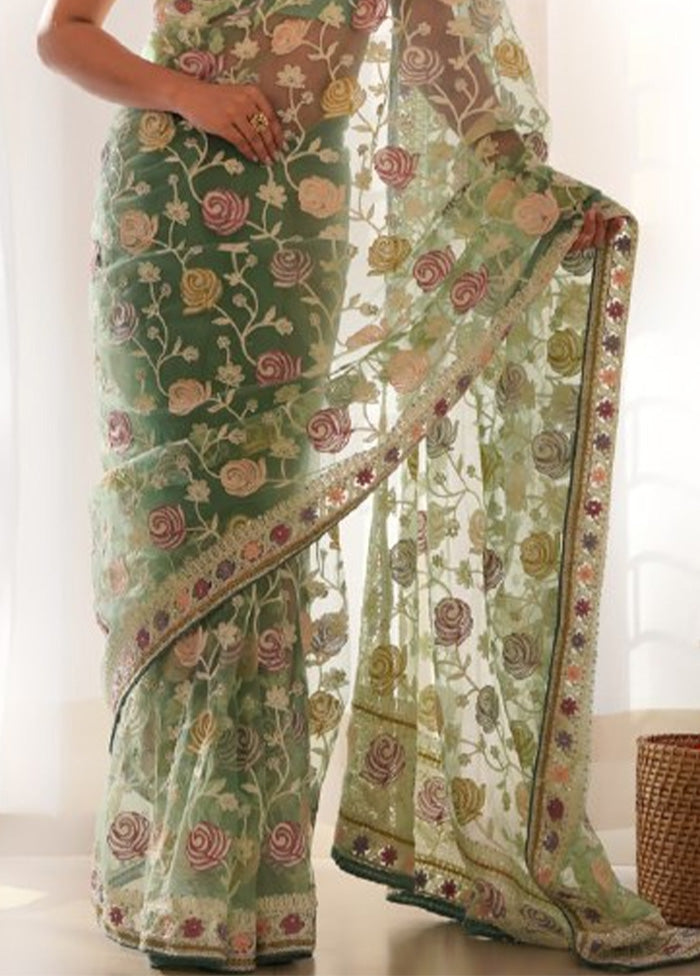 Pista Green Net Saree With Blouse Piece