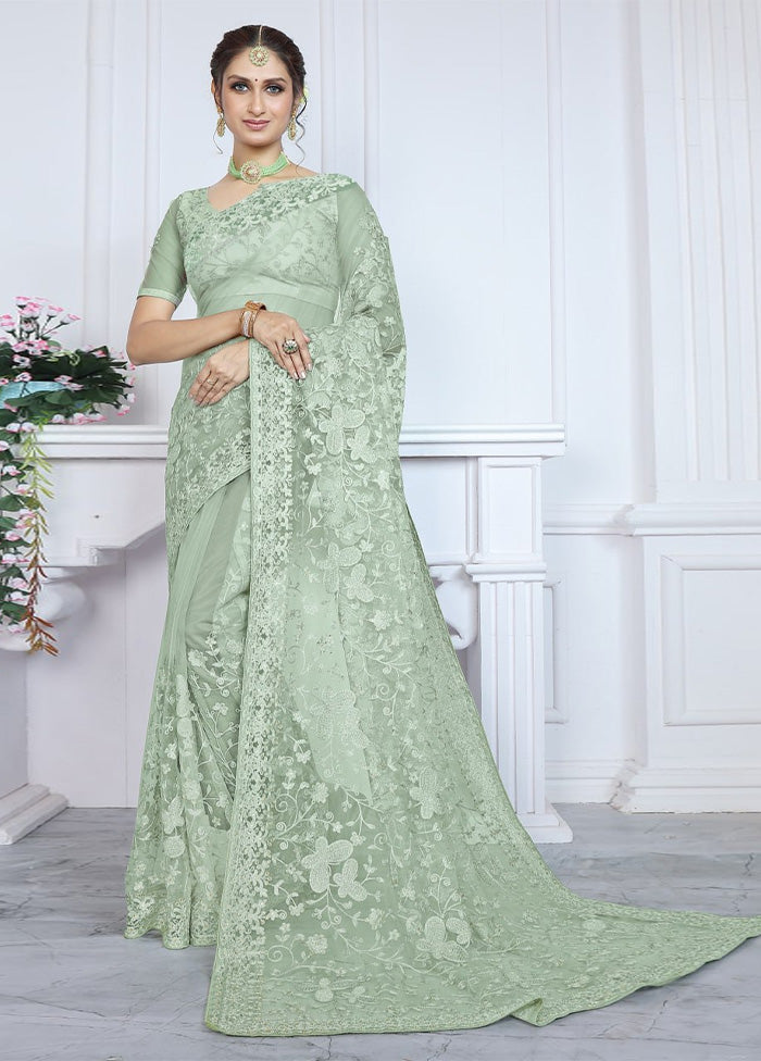 Pista Green Net Saree With Blouse Piece